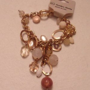 NWT LOVELY  CHARM BRACELET. TUB2-1